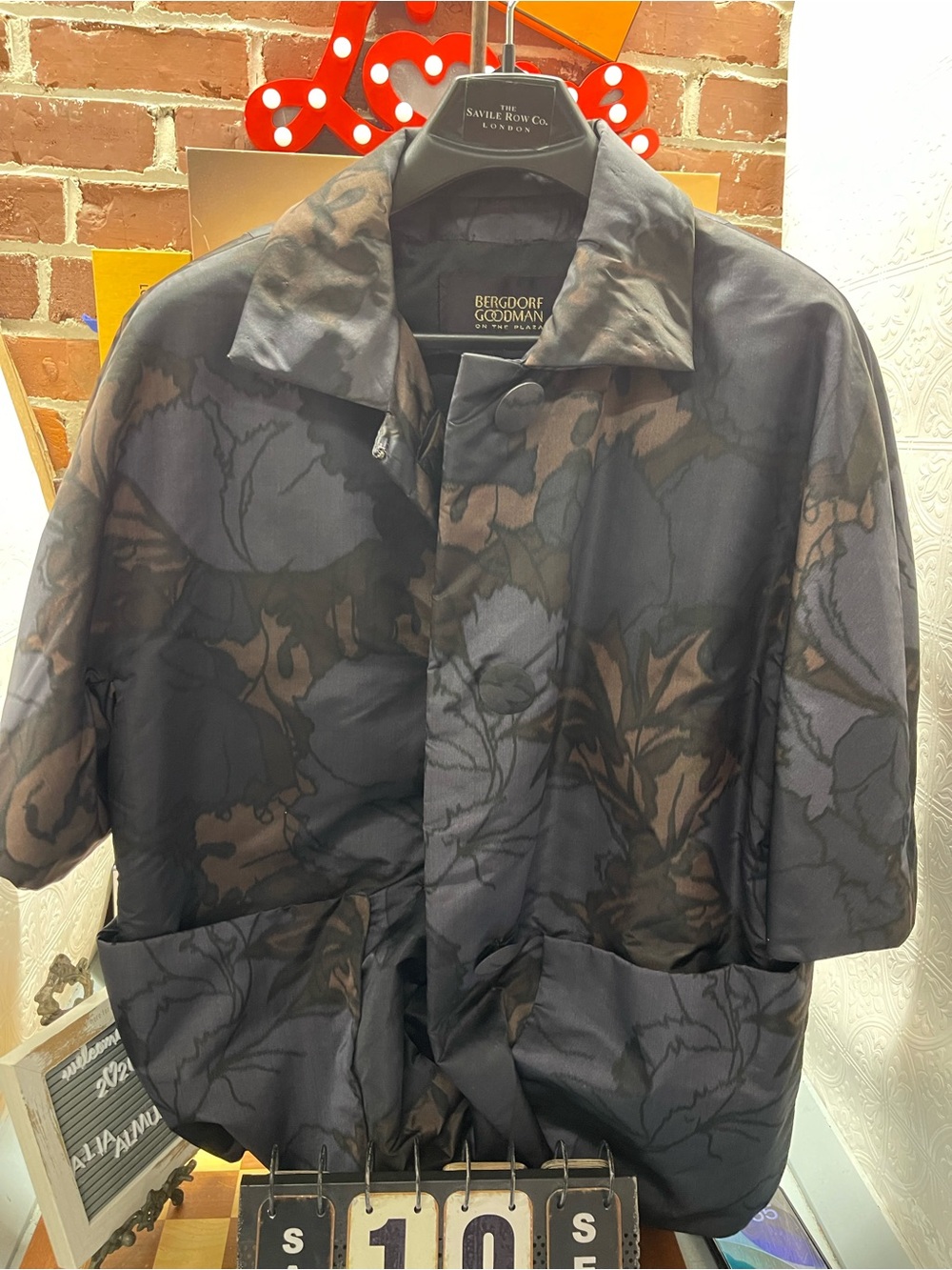 dark floral-patterned short-sleeve button-up jacket a Bergdorf Goodman